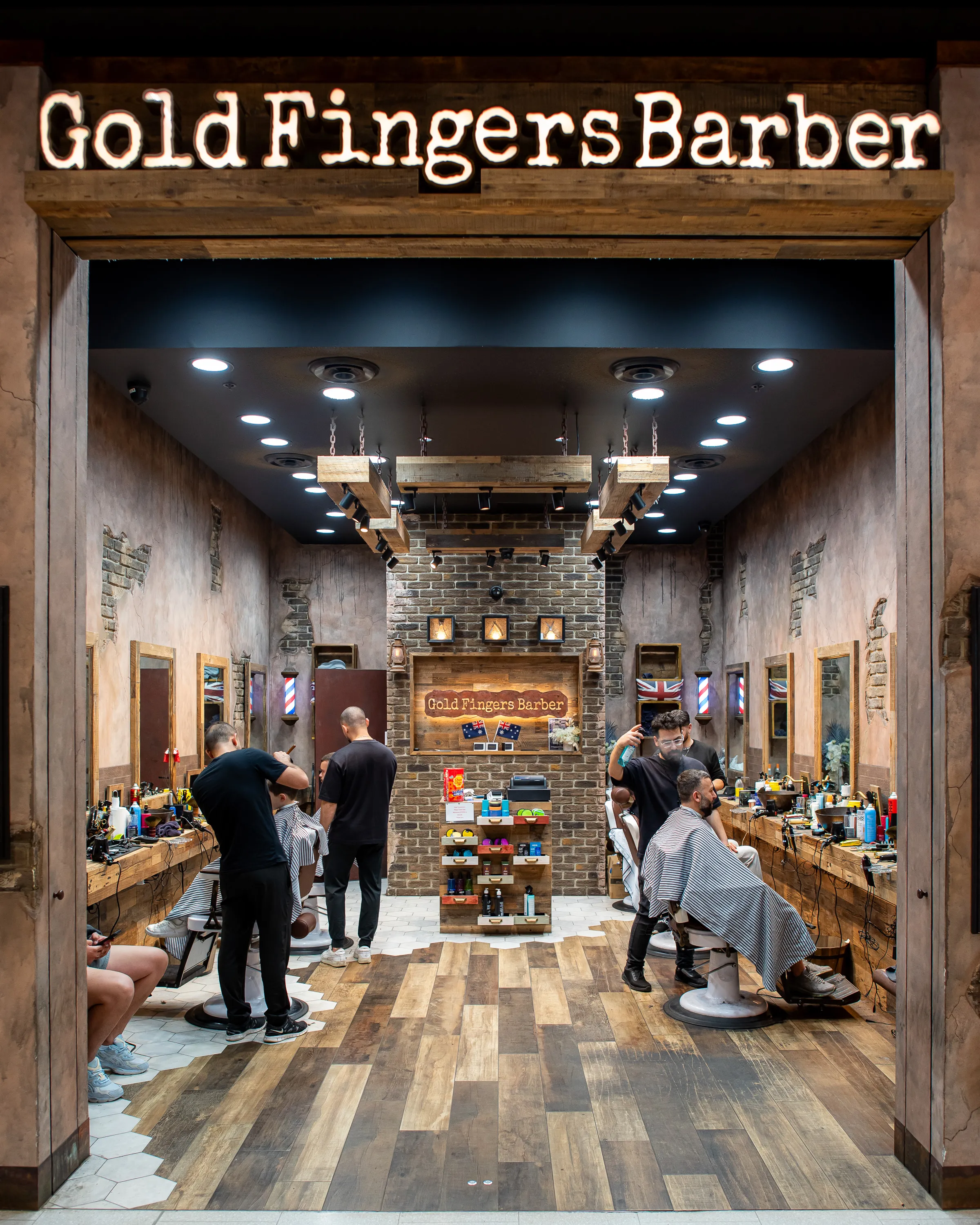 Entrance of a Gold Fingers Barber shop
